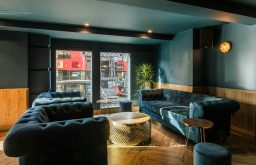 comfortable meeting space, blue sofas, view of the outside