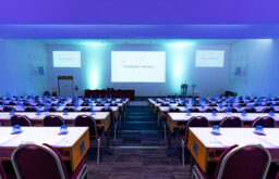 auditorium, stage, speakers, glasses
