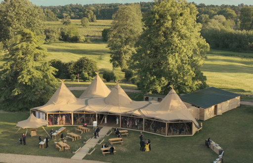 Tipis at Mapledurham, food catering, nice scenery, event in action