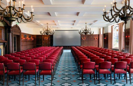 theatre layout, projector screen, red chairs