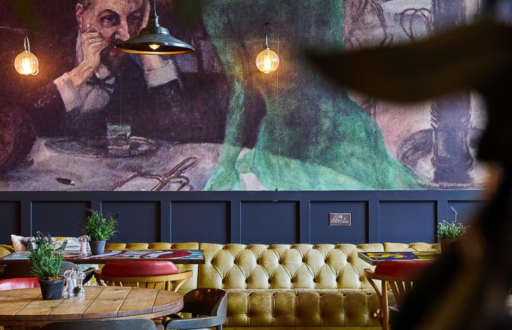 restaurant, dining space, mural on the wall, tables and chairs, private dining