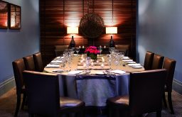 dining layout, dimly lit lights, leather chairs