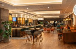 bar area, high stools and tables, event space