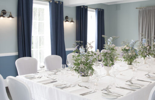 meeting room, fine dining, intimate, centrepieces, nicely decorated