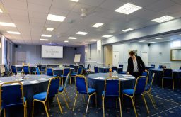 conference, cabaret layout, projector screen, flipchart