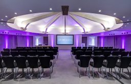 conference space, projector screen, purple lightling