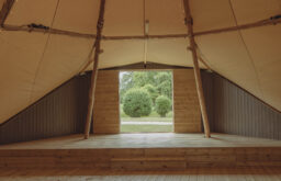 open canvas space of a tipi, outdoor venue