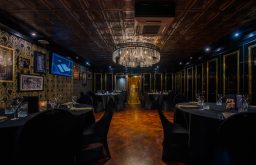 vault room, fine dining, corporate event, chandelier, plasma screen on the side of the wall