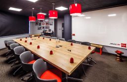 meeting room, whiteboard, red light shades