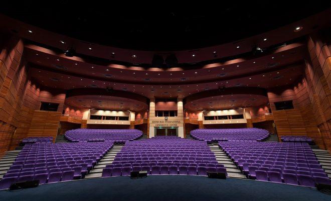 large auditorium, purple chairs