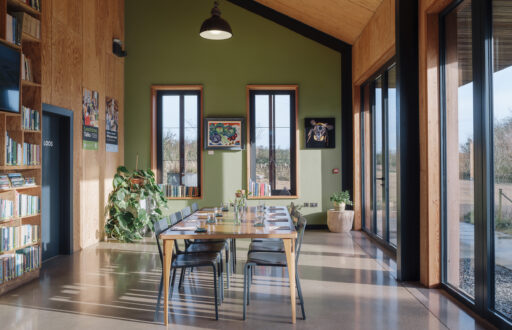 modern meeting room, library, boardroom layout, natural daylight