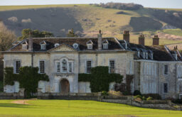 exterior of Firle Place, views of the moorlands, bright and sunny day