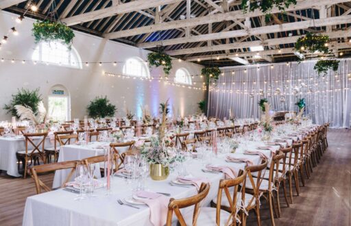 barn, event, dinner set up, row of tables nicely decorated