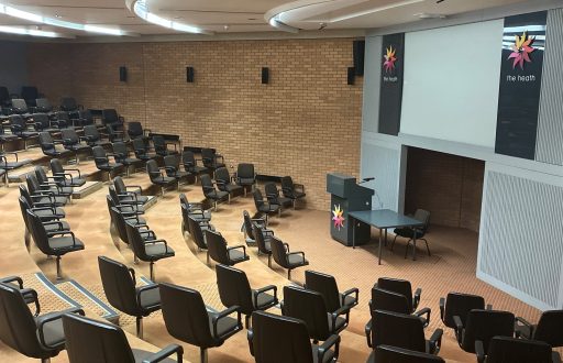 auditorium, top table, lecturn, comfortable chairs