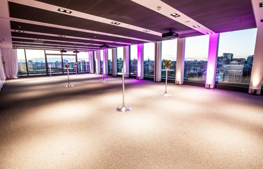glass table stands, sky view, open event space
