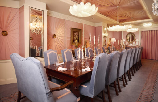 brightly pink, private dining room, intimate, boardroom layout