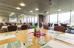 clusters layout, projector screen, comfy chairs, windows