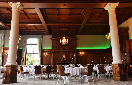 grand conference room, columns, dinner setup, fine dining, chandelier