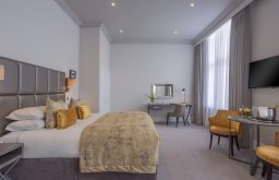 luxury room, bed, tv screen, window