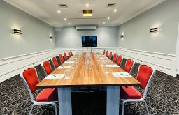 boardroom, red chairs, large space, plasma screen