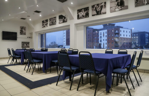 meeting room, window view, natural daylight, modern, TV screen