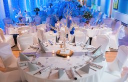 Christmas dinner party set up, nicely decorated, event, white and blue theme