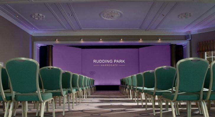 conference space, massive projector screen, green chairs, harrogate