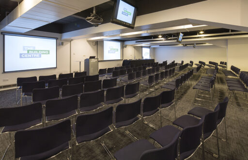 theatre layout, two small three TV screens, three projector screens, lecture
