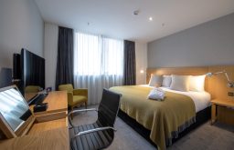 hotel room, TV, desk and vanity