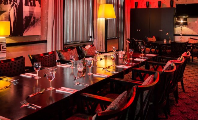 events, red lit room, intimate, private dining,wine glasses