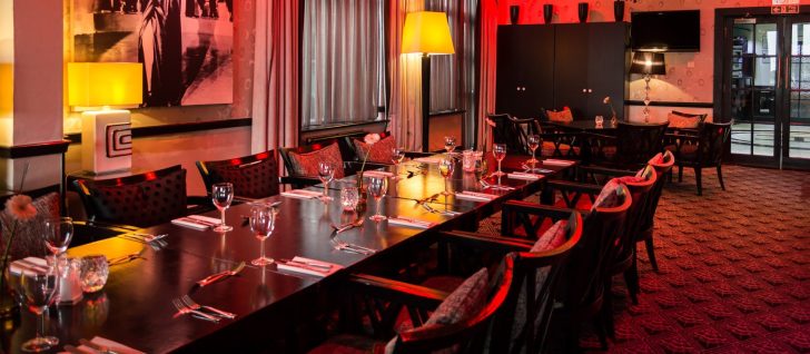events, red lit room, intimate, private dining, wine glasses, dorset