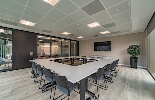 modern meeting room, plasma screen, square boardroom set up