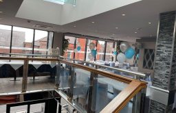 balancony event space, sliver & blue balloons, refreshment table