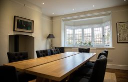 modern meeting room, comfortable chairs, window