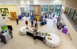 refreshment table, coffee machine, milk, pastries, hot water, sugar, tea sachets